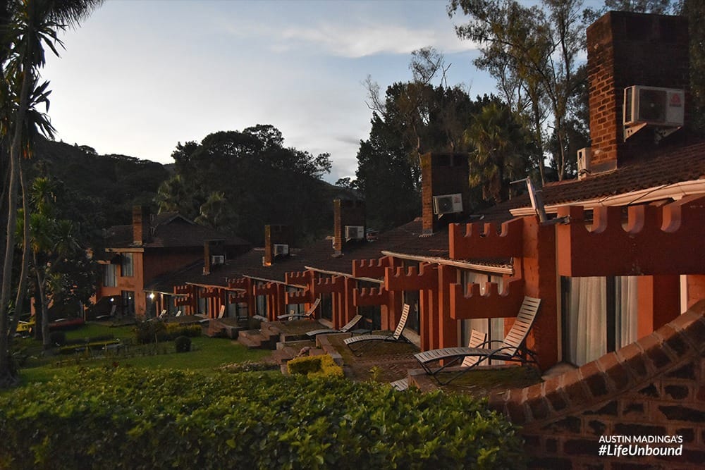 The facade of Ku Chawe Inn bathed in the evening sun