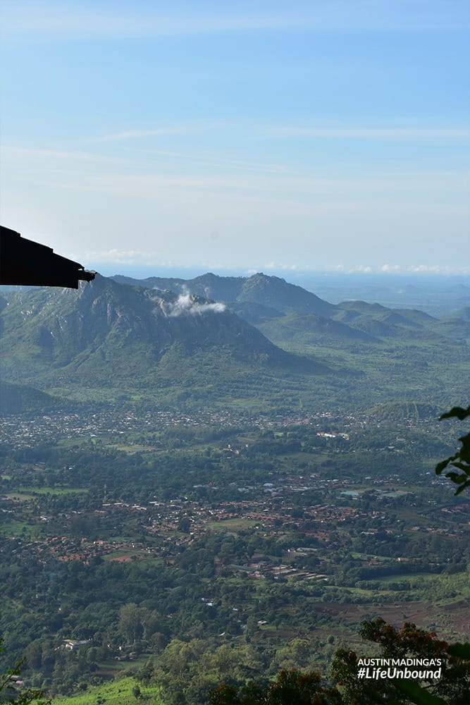 Zomba city and distant hills can be seen form the plateau above